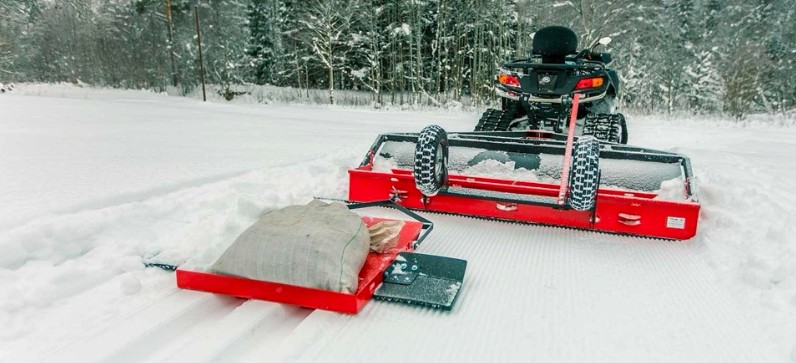 Spårsläde och skoter för kvalitativa spår